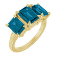 14K Yellow 8x6 mm Emerald Natural London Blue Topaz Three-Stone Ring