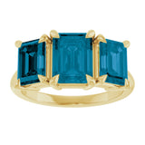 14K Yellow 8x6 mm Emerald Natural London Blue Topaz Three-Stone Ring