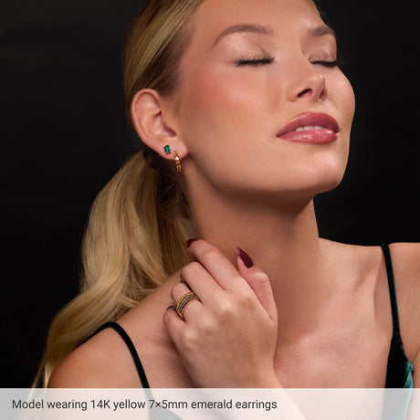 14K Yellow Gold 7x5 mm Natural Swiss Blue Topaz Stud Earrings