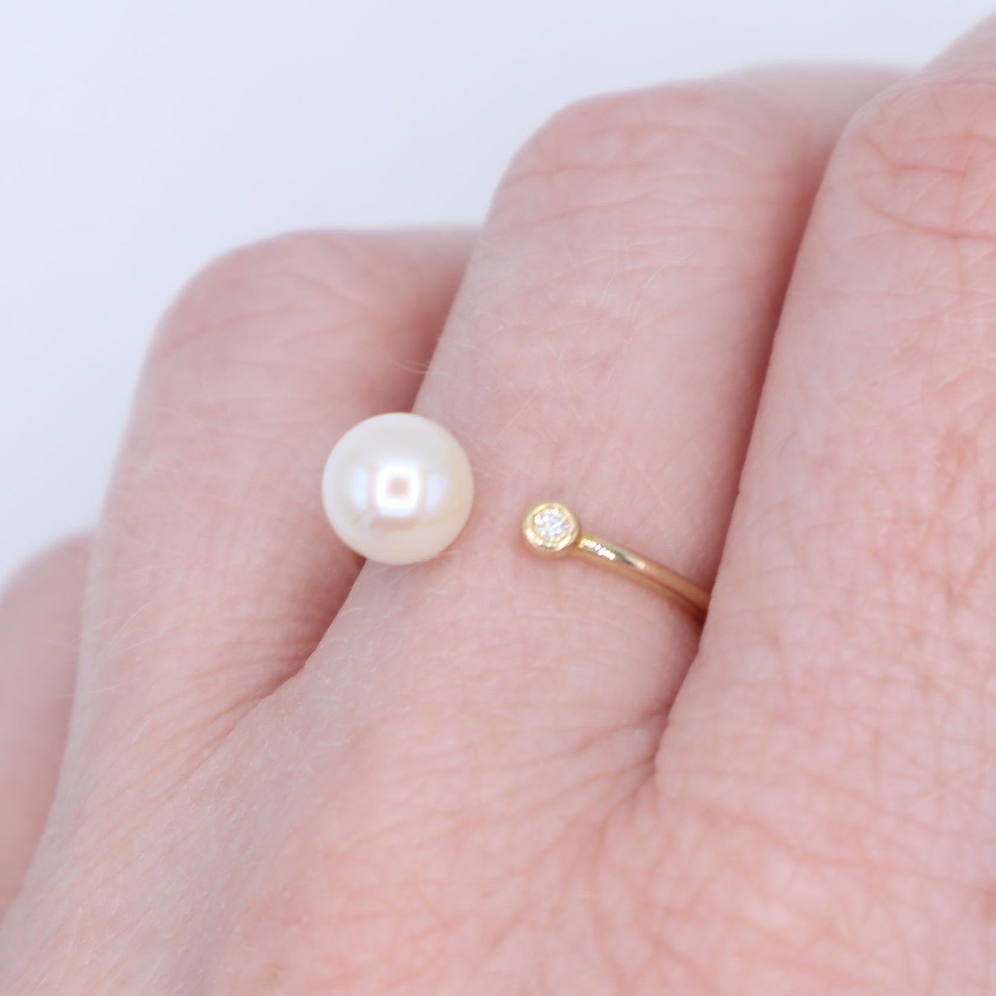Pearl and Diamond Negative Space Ring