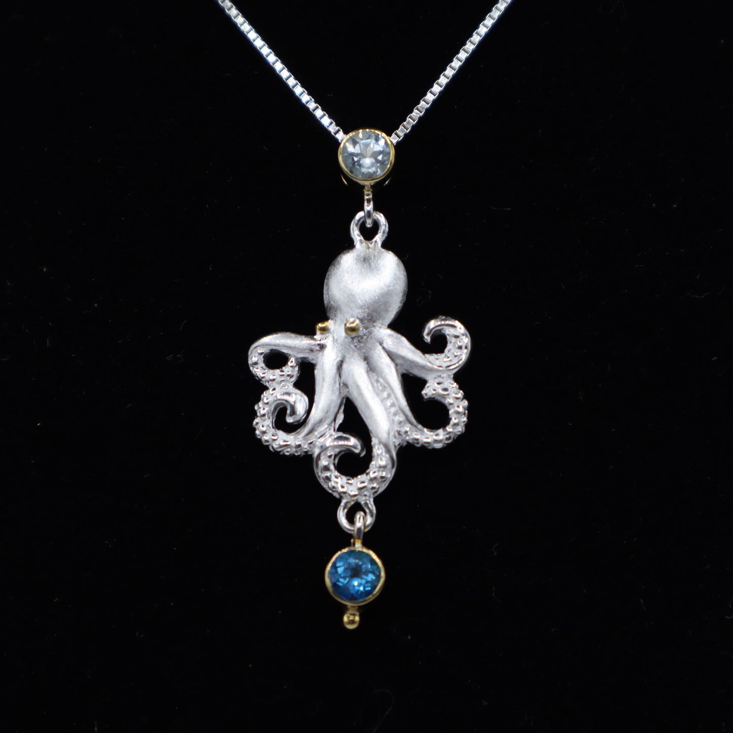 Silver Octopus Pendant with Blue Topaz