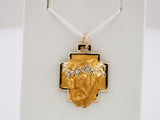 14K Yellow/White .03 CTW Natural Diamond Face of Jesus Crown Cross Pendant