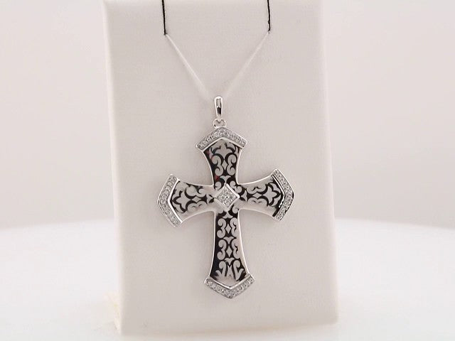Sterling Silver 1/5 CTW Natural Diamond Cross Pendant 