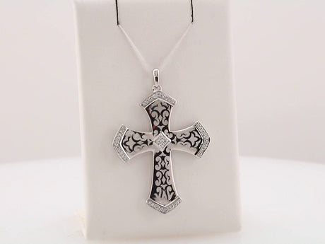Sterling Silver 1/5 CTW Natural Diamond Cross Pendant 
